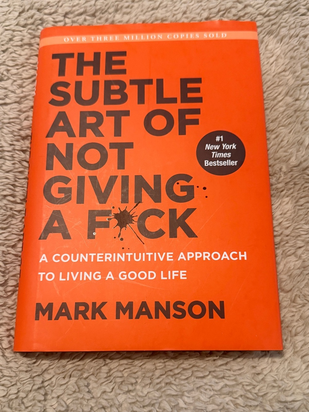 The Subtle Art of Not Giving a F*ck - Orange Cover by Mark Manson